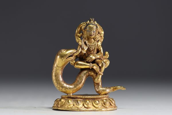 Chine - Tibet - Vidyadhara, sculpture en bronze doré aux yeux polychromes.