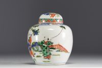 China - Covered ginger pot in green family polychrome porcelain with figures.