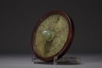 China - Carved jade hand mirror.