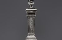 Pair of solid silver candlesticks, five points of light, hallmarks (three diamonds) on the base.