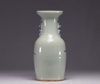 China - A blue-white porcelain vase on a celadon background decorated with figures, 19th century.