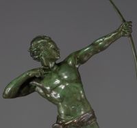 Jean DE RONCOURT (19th-20th century) ‘The Archer’ Large Art Deco sculpture in green patina regula on black marble base, circa 1930.