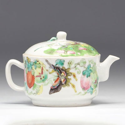 Famille rose porcelain teapot decorated with butterflies and flowers