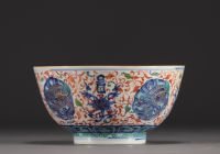 China - Large porcelain bowl decorated with lions in cartouche and flowers, Ming mark.