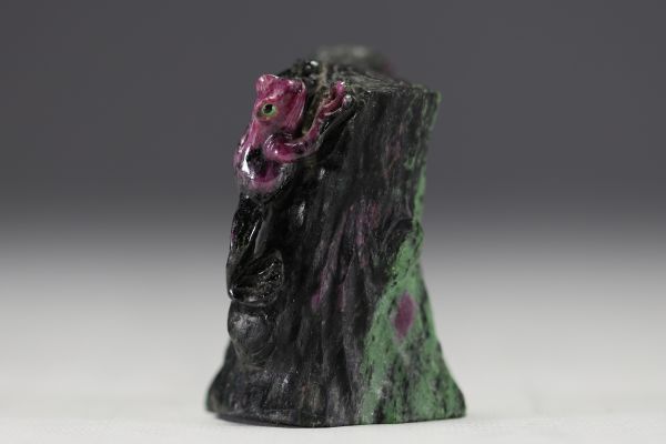 Amalric WALTER (1859 - 1942) and Henri BERGÉ (1870 - 1937) in the style of - ‘Grenouille sur un tronc’ Small sculpture in purplish pink and green pâte de verre, unsigned.