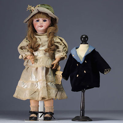 SFBJ - Cast bisque head doll, open mouth, sleeping blue eyes, debossed with SFBJ 301 Paris, between 1899 and 1920.