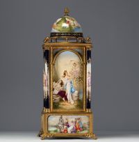 VIENNA - Imposing architectural clock in the form of a temple surmounted by a dome, polychrome porcelain with antique-style figures, bronze mounting.