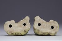 China - pair of glazed porcelain dogs with green collars.