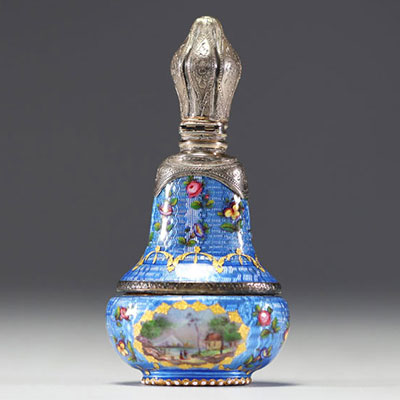 A rare silver and guilloché enamel salt flask decorated with flowers and landscape scenes, 19th century.