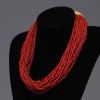 Chine - Collier en petites perles de corail rouge.