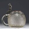 German diamond-point glass tankard with pewter lid featuring a figure.