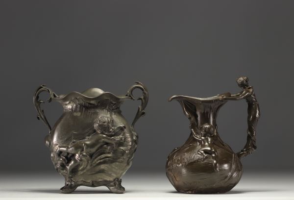 Set of a polished pewter Art Nouveau jug and vase, circa 1900.