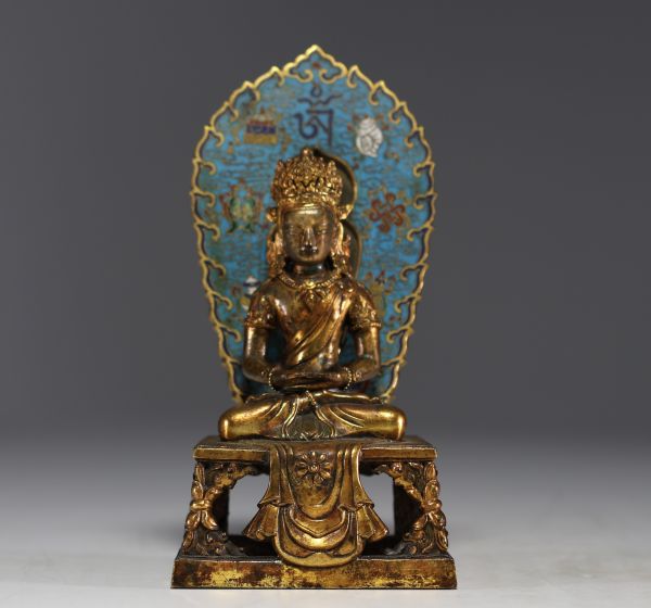 China - A gilt bronze and cloisonné figure of Amitayus from the 18th century.