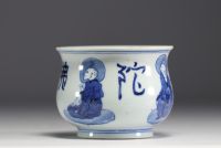 China - White and blue porcelain brush with sage decoration.