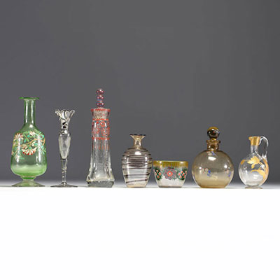 Set of seven pieces of various glassware, vases, carafes, bowls, enamelled and others.