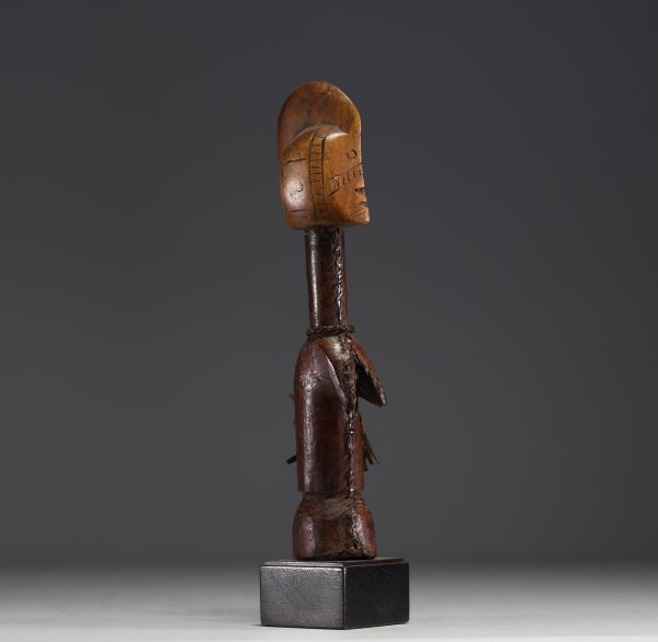 Africa - BURKINA - MOSSI - Fertility doll in carved and scarified wood covered in leather.