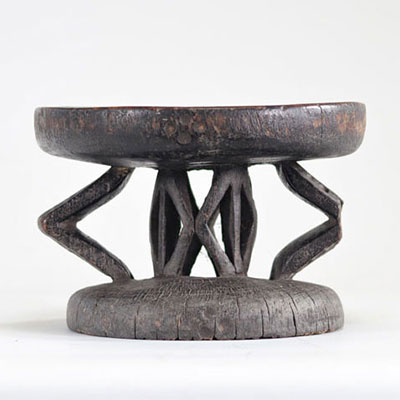 Wooden stool with dark patina from Africa