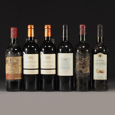 Set of 13 bottles of wine from various regions.