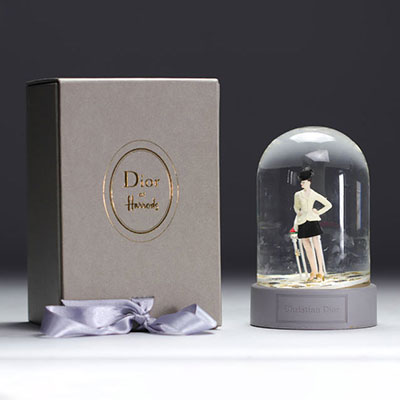 CHRISTIAN DIOR snow globe representing a customer of the Avenue Montaigne boutique wearing the 1997 