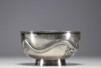 China - Large solid silver bowl decorated with dragons in relief.