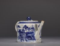 China - A white and blue porcelain teapot decorated with landscapes and a junk, 18th century.