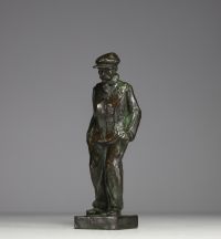 F. GOSSÉ (XIX-XX) ‘Les mains dans les poches’ Sculpture in bronze with green patina, 20th century.