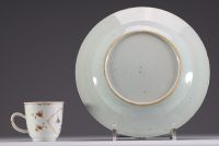 China - Set of two Compagnie des Indes polychrome porcelain pieces comprising a plate and a cup, 18th century.