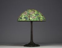 TIFFANY STUDIOS ‘New York’ 1900 - Table lamp with bronze base and floral glass mosaic shade, signed and numbered under the base.