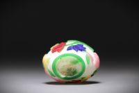 China - Snuffbox in multi-layered glass with floral decoration on a white background