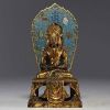 China - A gilt bronze and cloisonné figure of Amitayus from the 18th century.