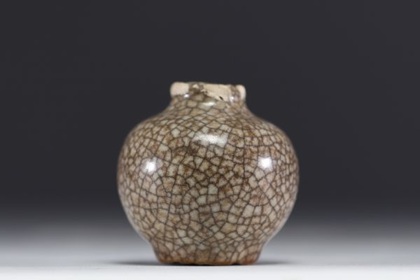 China - Crackled monochrome ceramic ball vase, Ming period.