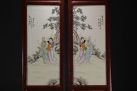 China - Pair of porcelain and wood panels decorated with characters.