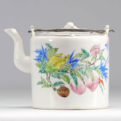 Porcelain teapot of the rose family decorated with peaches and flowers