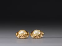 CHANEL - Pair of gold-coloured earrings, mother-of-pearl cabochon.