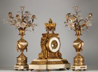 Imposing Louis XVI ormolu and white marble clock and candelabra.