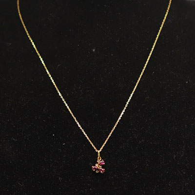 Necklace in 18k gold, rubies and diamonds weighing 2.5gr.