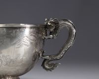 Hung Chong & Cie, large solid silver bowl with engraved landscape decoration, dragon-shaped handles.