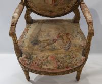 Important ensemble de mobilier de salon en bois sculpté et doré, tapisserie fine d'Aubusson comprenant un canapé et une suite de quatre fauteuils bergères, XIXème.