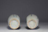 China - Pair of blue-white porcelain vases with floral and poem decoration, 19th century.
