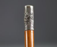 China - Silver cane with dragon decoration, late 19th century.