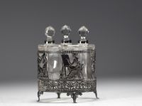 Three glass perfume bottles with silver mountings in the Empire style.