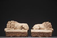 Pair of sculpted marble Lions, probably 18th century.