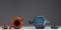 China - Set of two Yixing clay teapots.