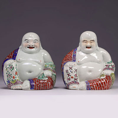 China - pair of Buddha in famille rose porcelain.