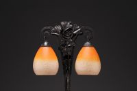 Charles SCHNEIDER (1881-1953) - Lampe de table en verre nuancé, pied en fer forgé à décor de Ginkgo biloba.