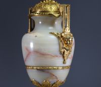 Imposing pair of Louis XVI chased gilt bronze and onyx cassolettes.