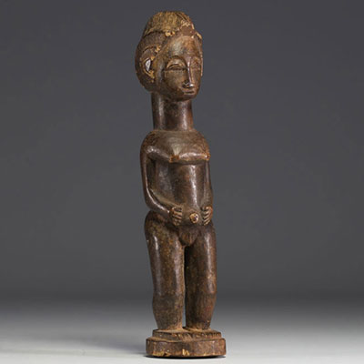 DRC - Iwena female statuette in carved wood.