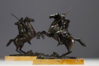 Pair of equestrian sculptures in bronze, figures in the antique style, on a marble base, Charles X period