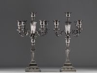 Pair of solid silver candlesticks, five points of light, hallmarks (three diamonds) on the base.