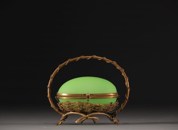 A Napoleon III period egg-shaped jewellery box in green opaline Palais Royal with brass mount.